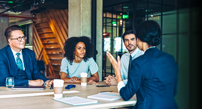 people meeting at table