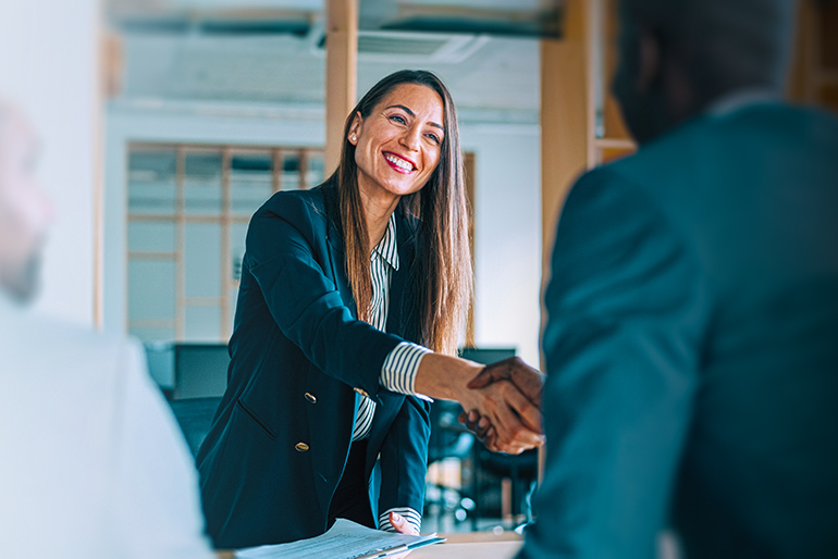 woman shaking hands