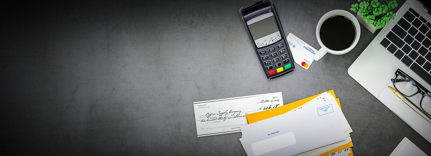 image of calculator coffee credit card and check