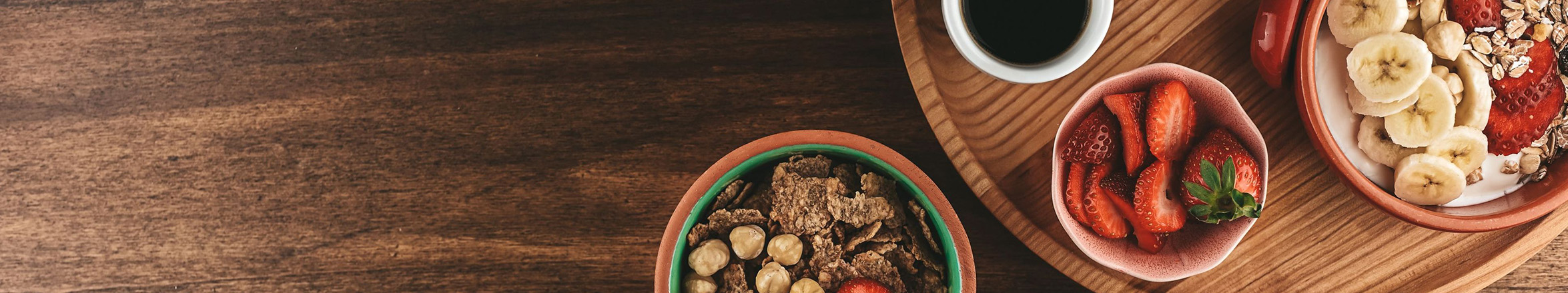 health foods on wood plates and bowls