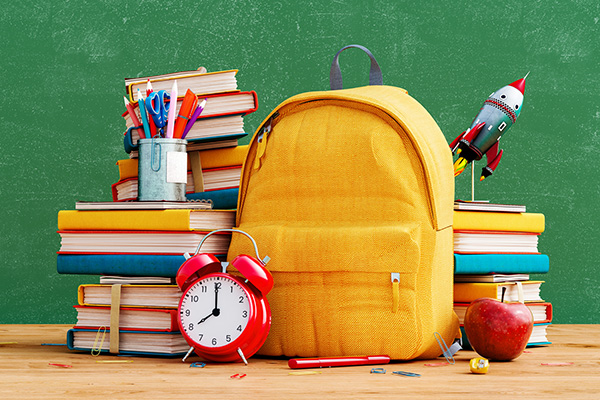 backpack, alarm and books